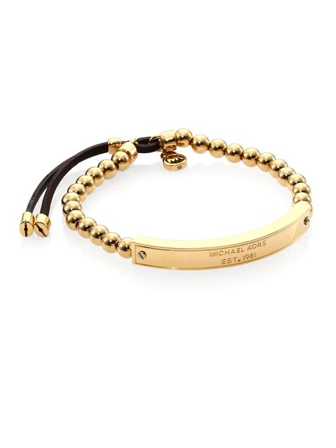 michael kors gold plaque bracelet|Michael Kors adjustable bracelet.